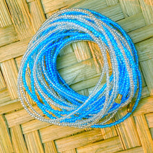 Load image into Gallery viewer, hand made african waist beads in clear white and light blue
