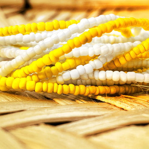 Handmade african waist beads in white and yellow waist beads