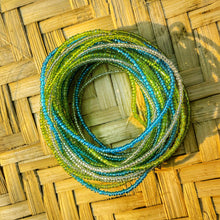 Load image into Gallery viewer, handmade african waist beads in light blue, lime green and clear white

