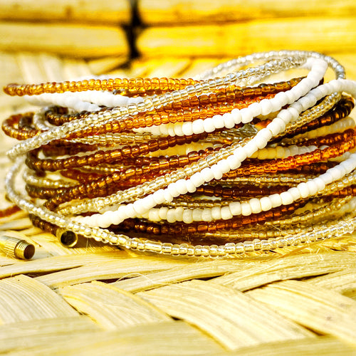 handmade african waist beads in solid white, clear white, gold and brown